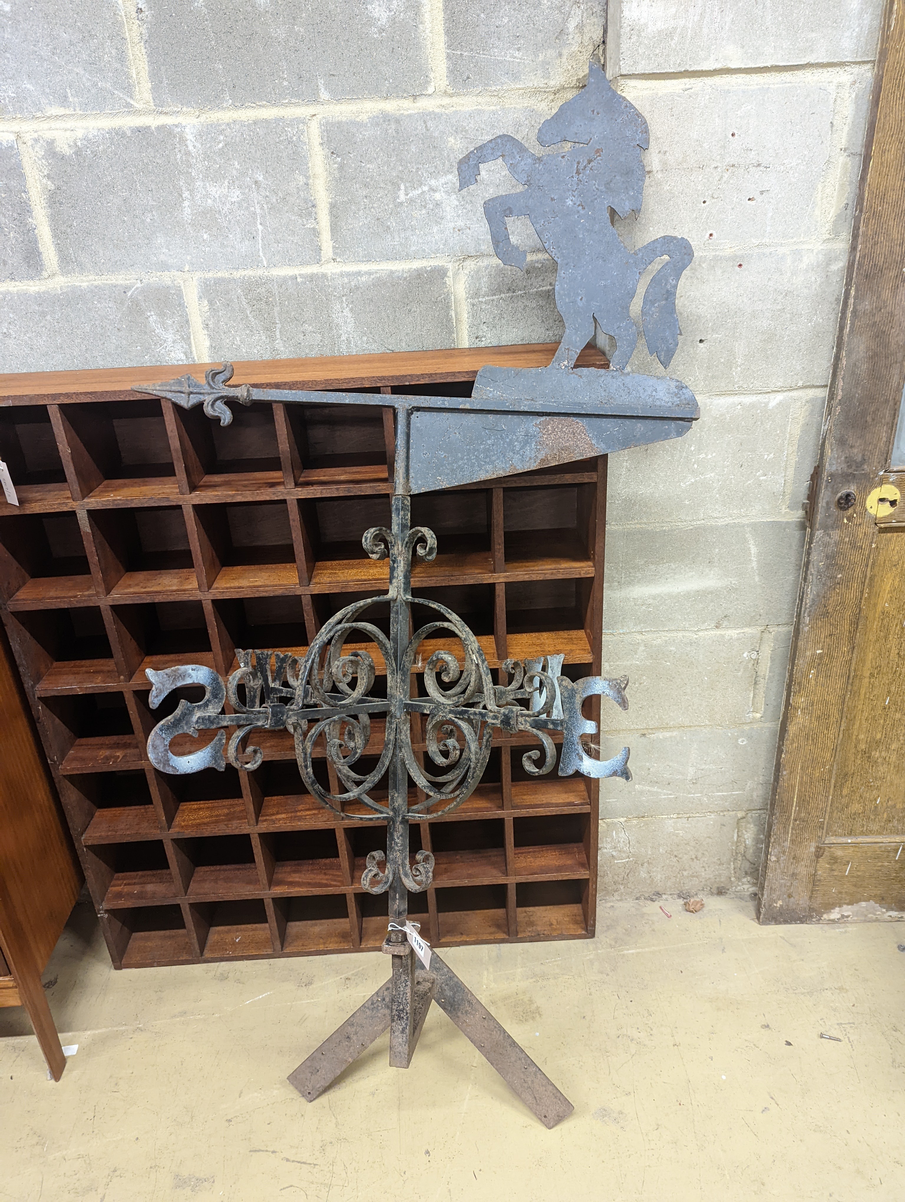 A wrought iron weather vane, width 90cm